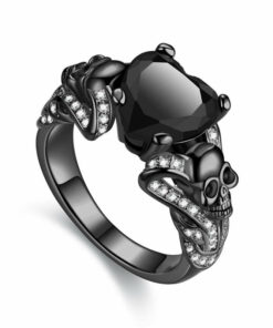 Heart Skull ring with black metal and black stone surrounded by small jewels, engagement ring
