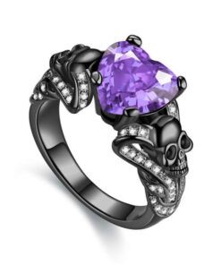 black skull ring with two skulls and purple stone